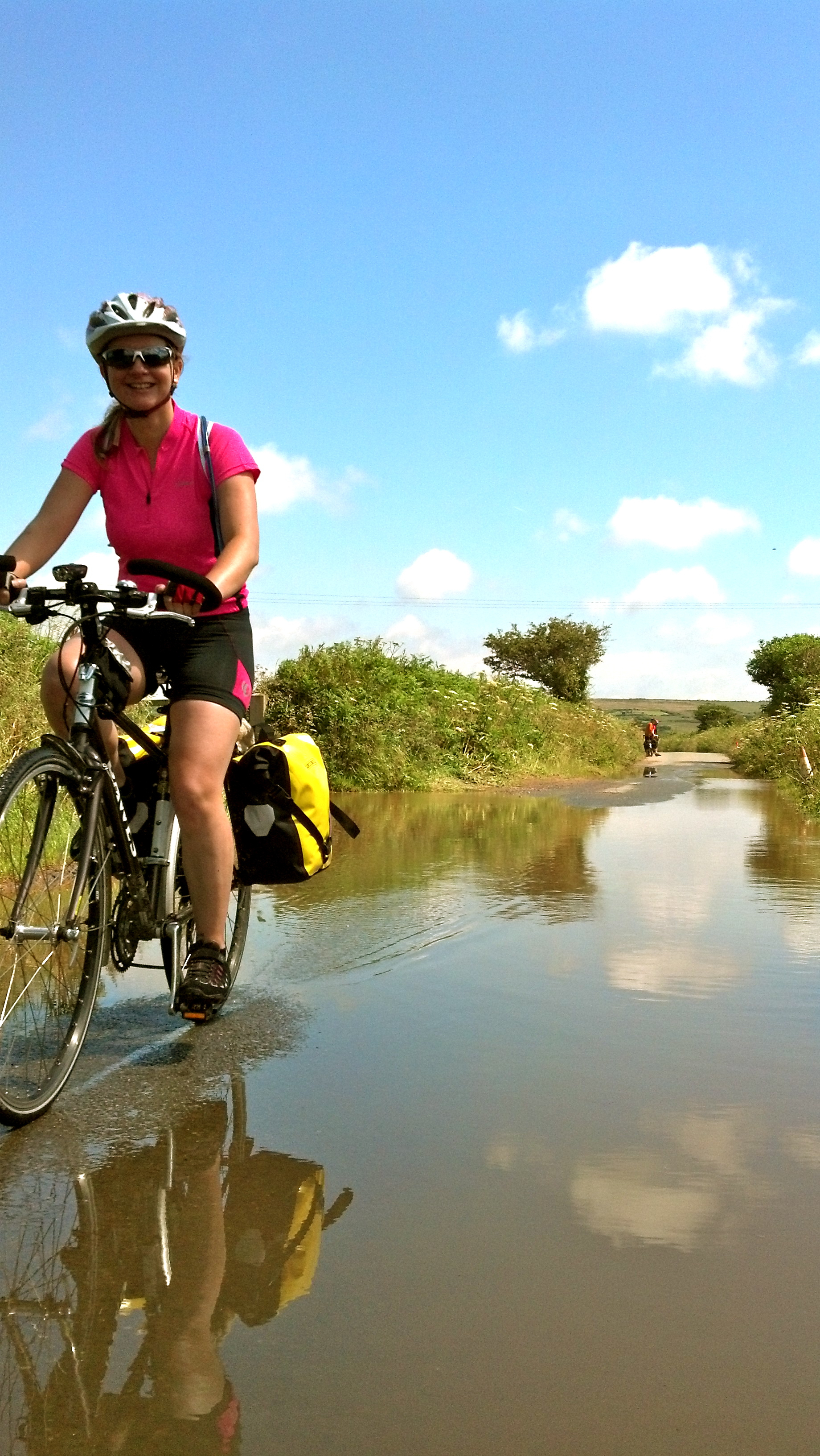 Sally cycling through water